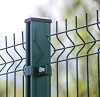 green metal fence